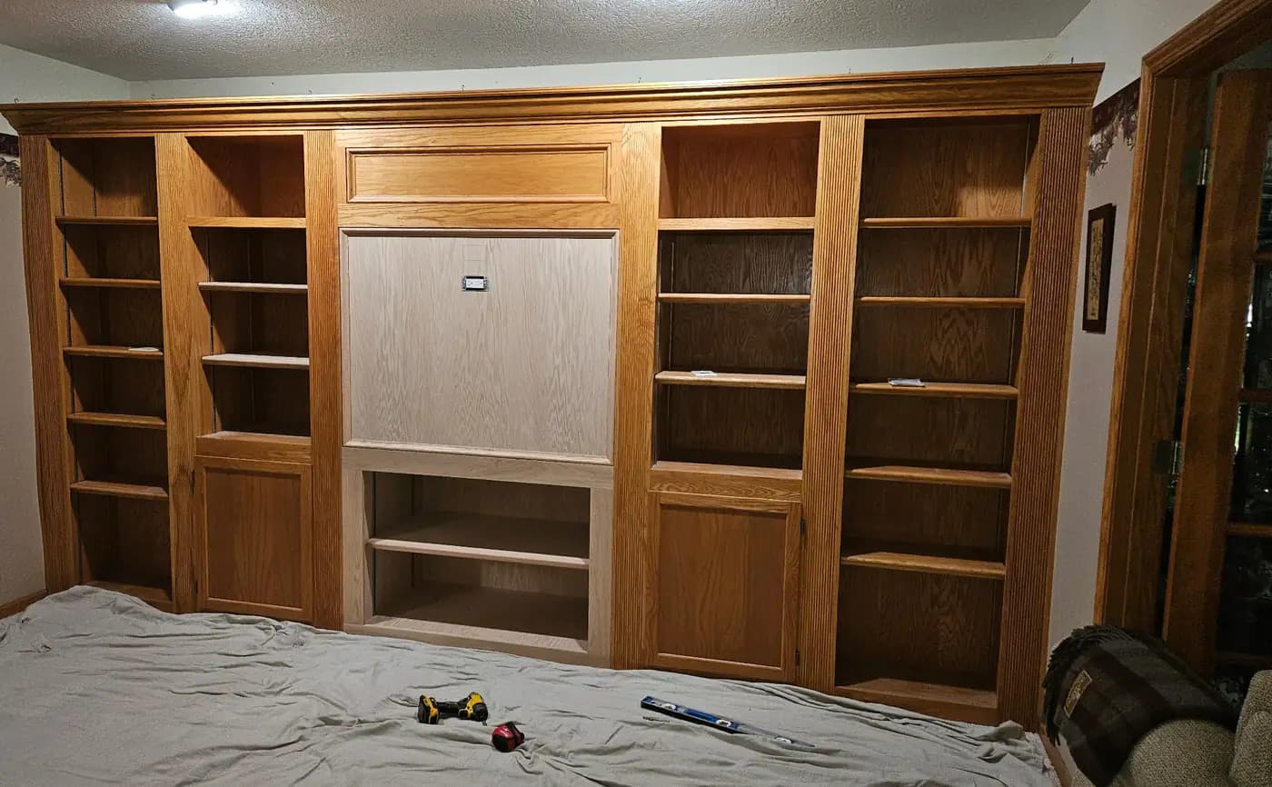 Oak built-in entertainment wall during construction