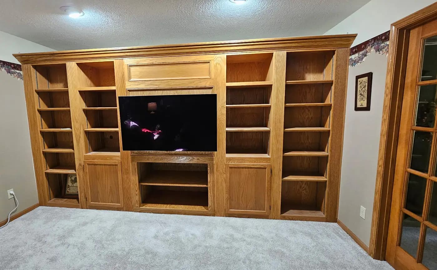Finished oak built-in entertainment wall